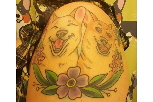 Rae's dog tattoo.